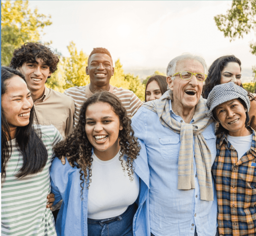 Neighbors of several generations standing together outdoors